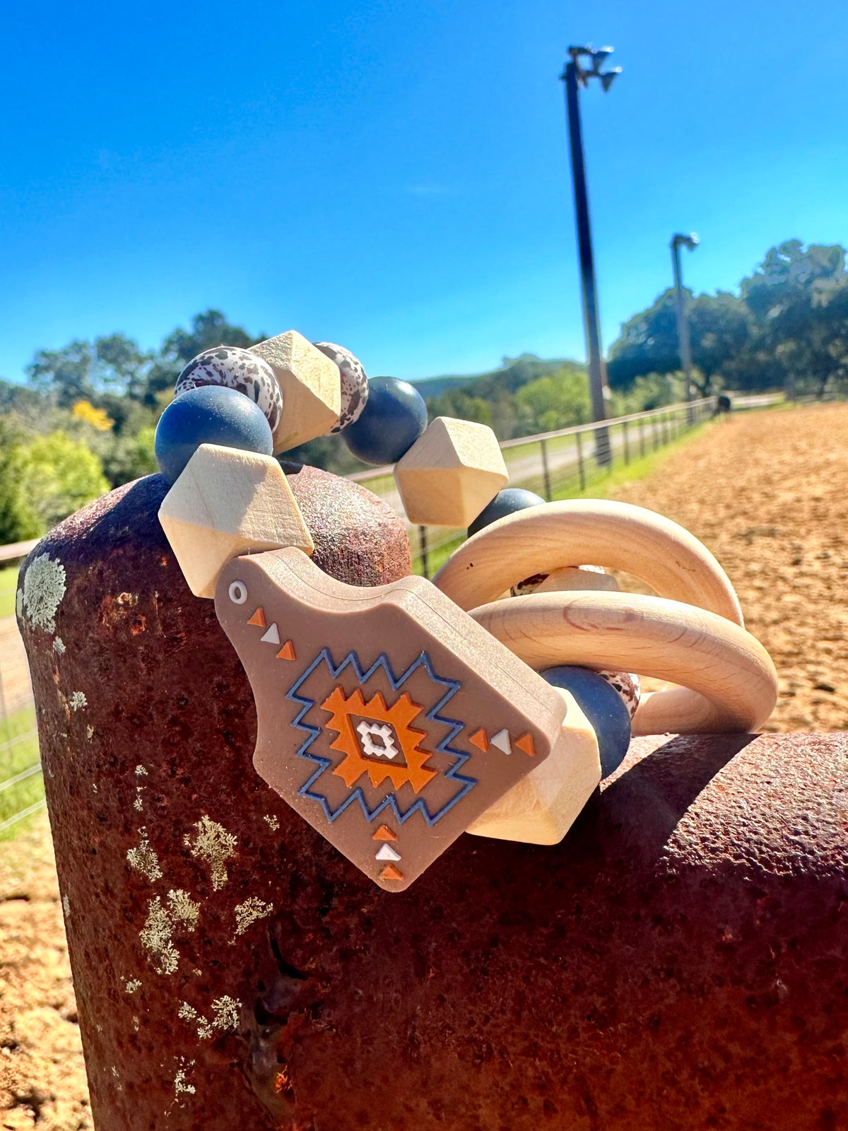 Chocolate Aztec Cow Tag Rattle